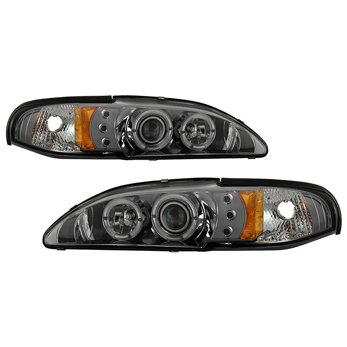 ( Spyder Signature ) Ford Mustang 94-98 1PC Projector Headlights - LED Halo - Amber Reflector - LED ( Replaceable LEDs ) - Smoke - High 9005 (Included) - Low H3 (Included)